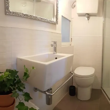 Elegante Luminoso Attico Centralissimo Appartamento